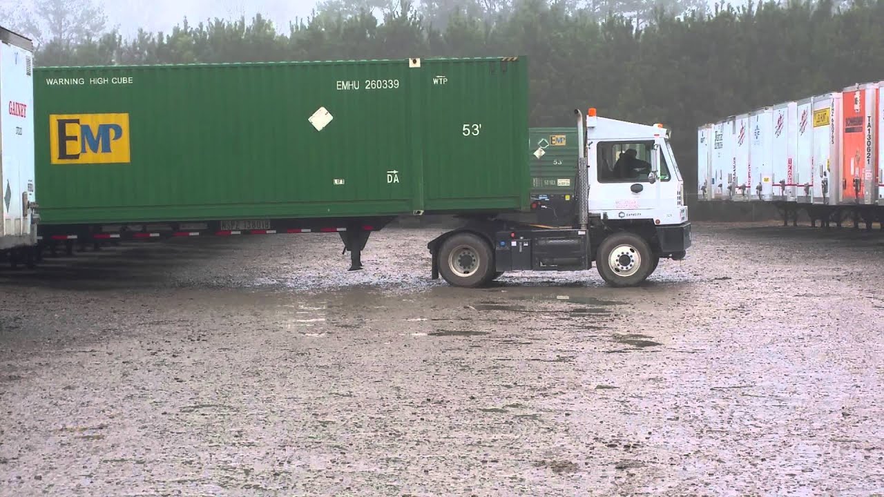 Driver backs up in one try.in a very small yard.