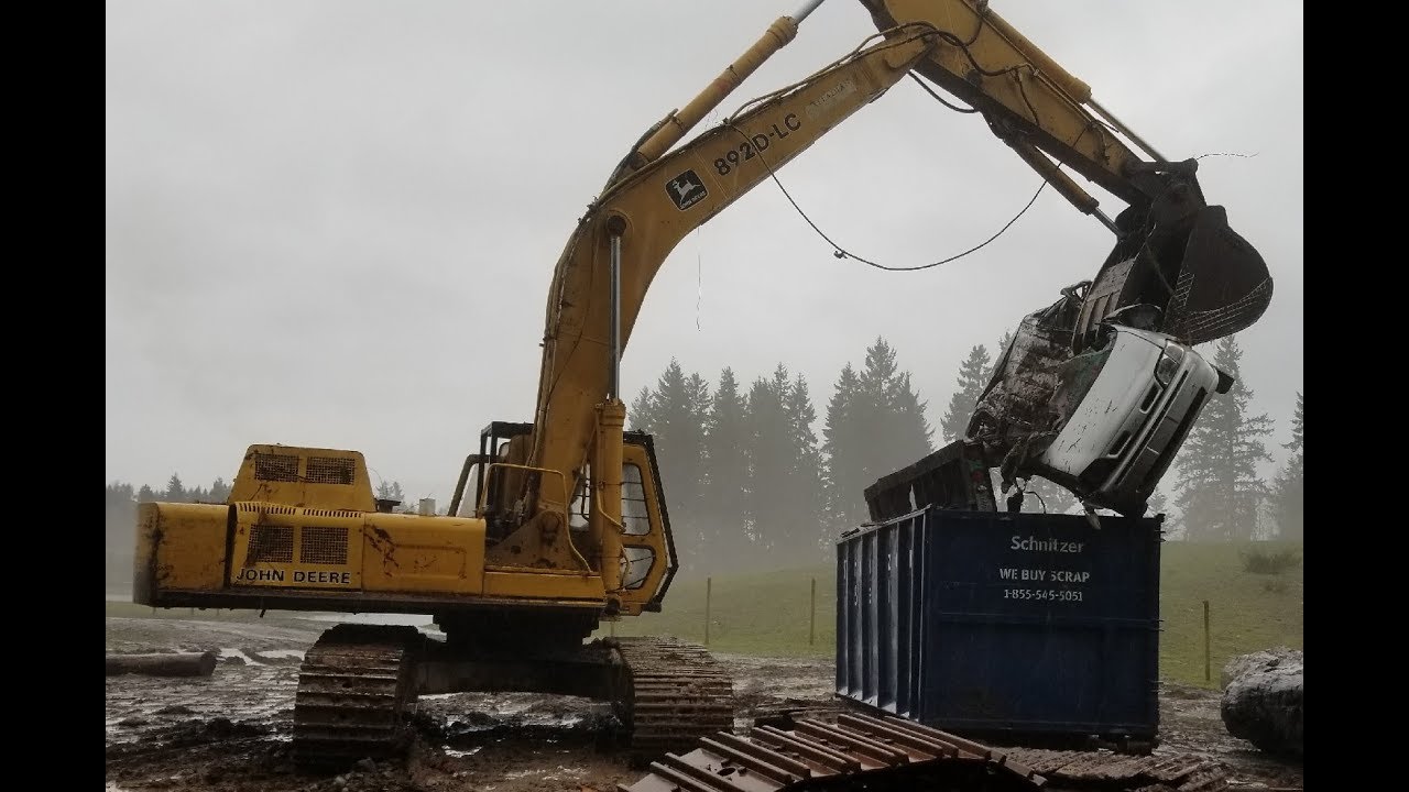 Van gets destroyed by Excavator