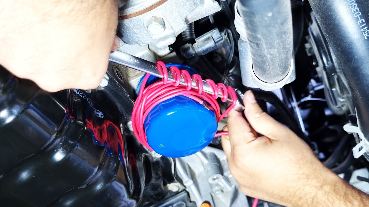 How to remove an oil filter without a filter wrench