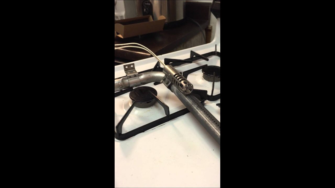 Installation of a Kenmore oven igniter burner.