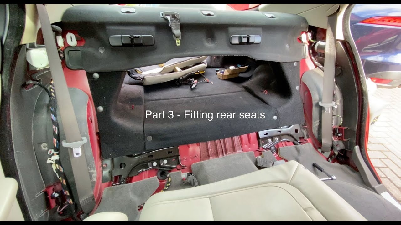Fitting the rears seats back in the Jaguar XF, PT 3