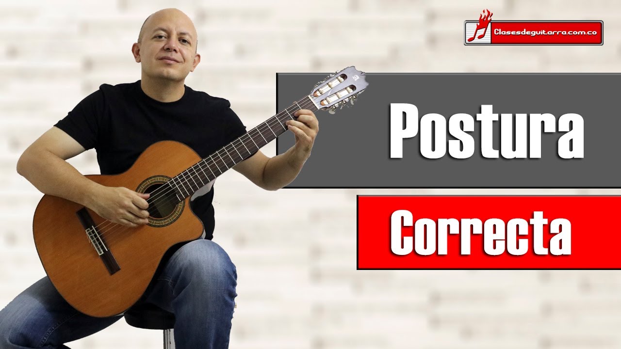 Cual es la posición correcta para tocar guitarra acústica