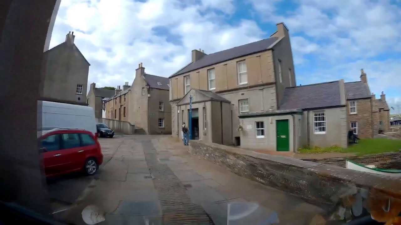 Driving down Main Street in Stromness, Orkney Islands