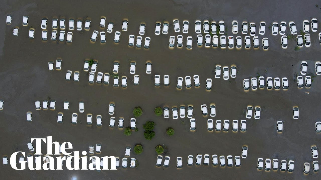 Rows of cars submerged as heavy rains pound India
