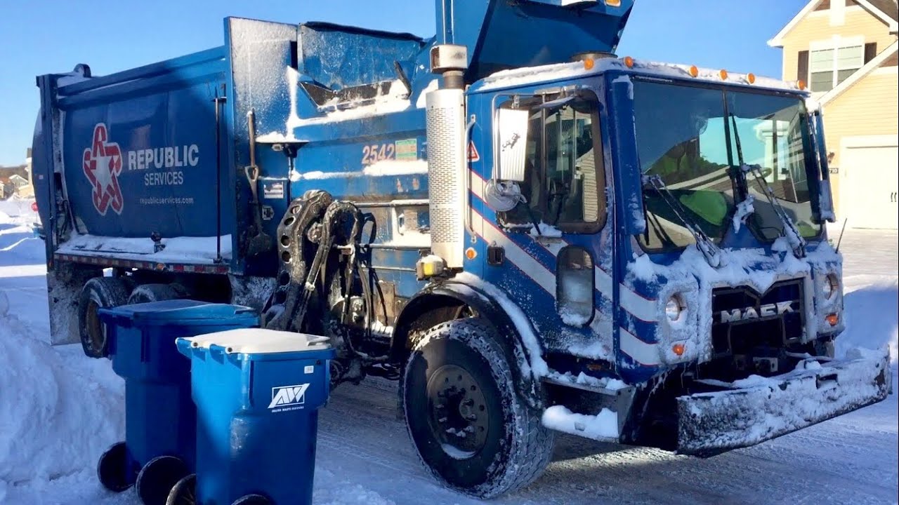 Garbage Trucks in the Snow