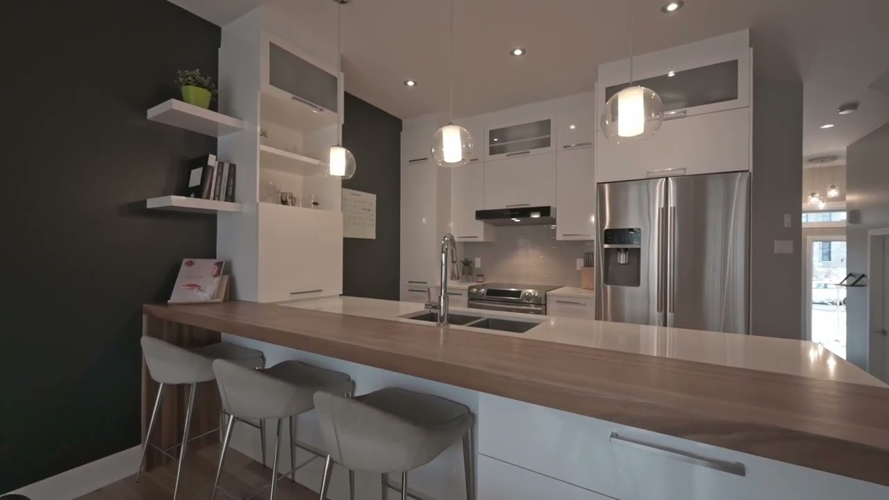 VENDU | Maison jumelée avec garage à Carignan | Équipe Louis Desrochers | Courtiers Immobiliers