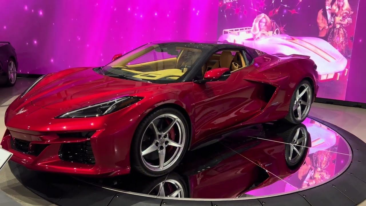 2024 Corvette eRay Convertible in Red Mist Metallic on the turntable display at the NCM