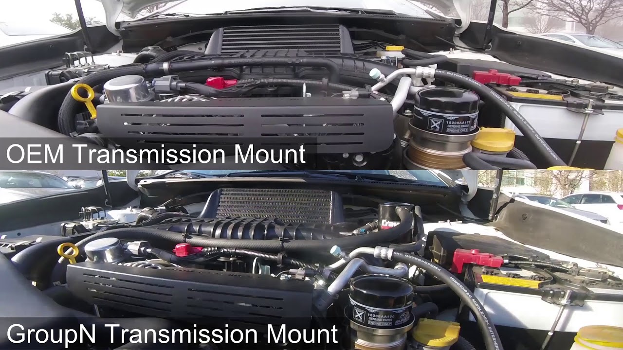 15+ WRX Group N trans mount before and after comparison