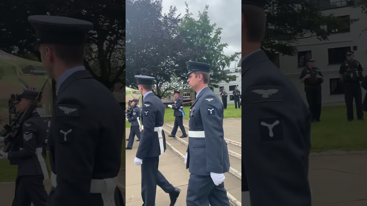 Air force pilots march across cathedral greens