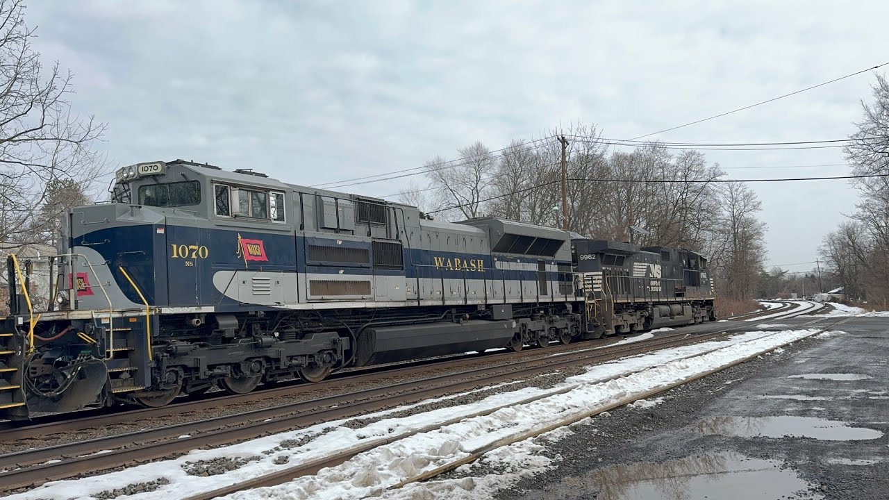 NS 9962 leads NS 24X through Piscataway NJ with NS 1070 Wabash heritage trailing 2/16/2026