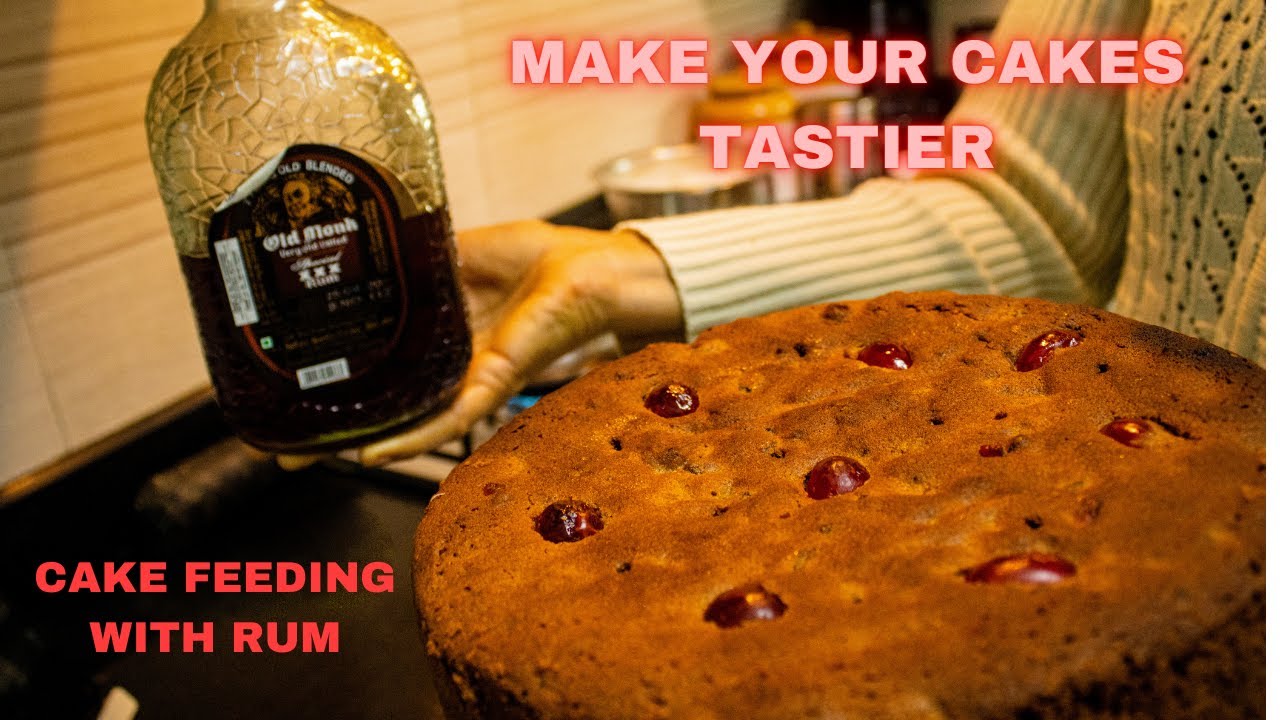 How to FEED PLUM CAKE WITH ALCOHOL/RUM in malayalam fruit cake feeding