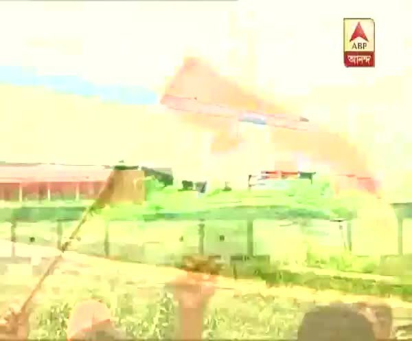 CPM leader Rabin Deb rides a Nano during rally in Singur