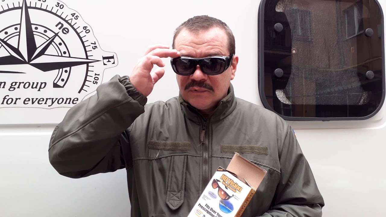 Солнцезащитные очки HD Vision , которые можно одеть поверх обычных очков с диоптриями.