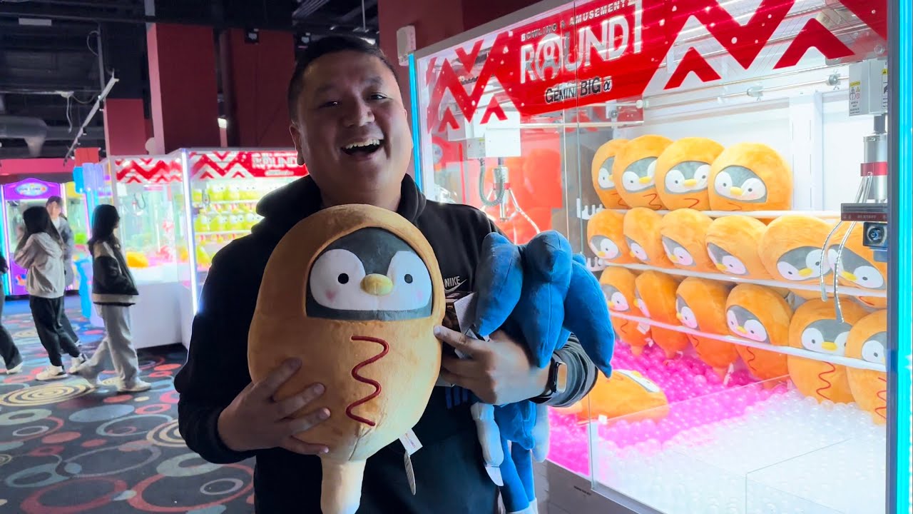 Playing a ton of crane games at Round 1!