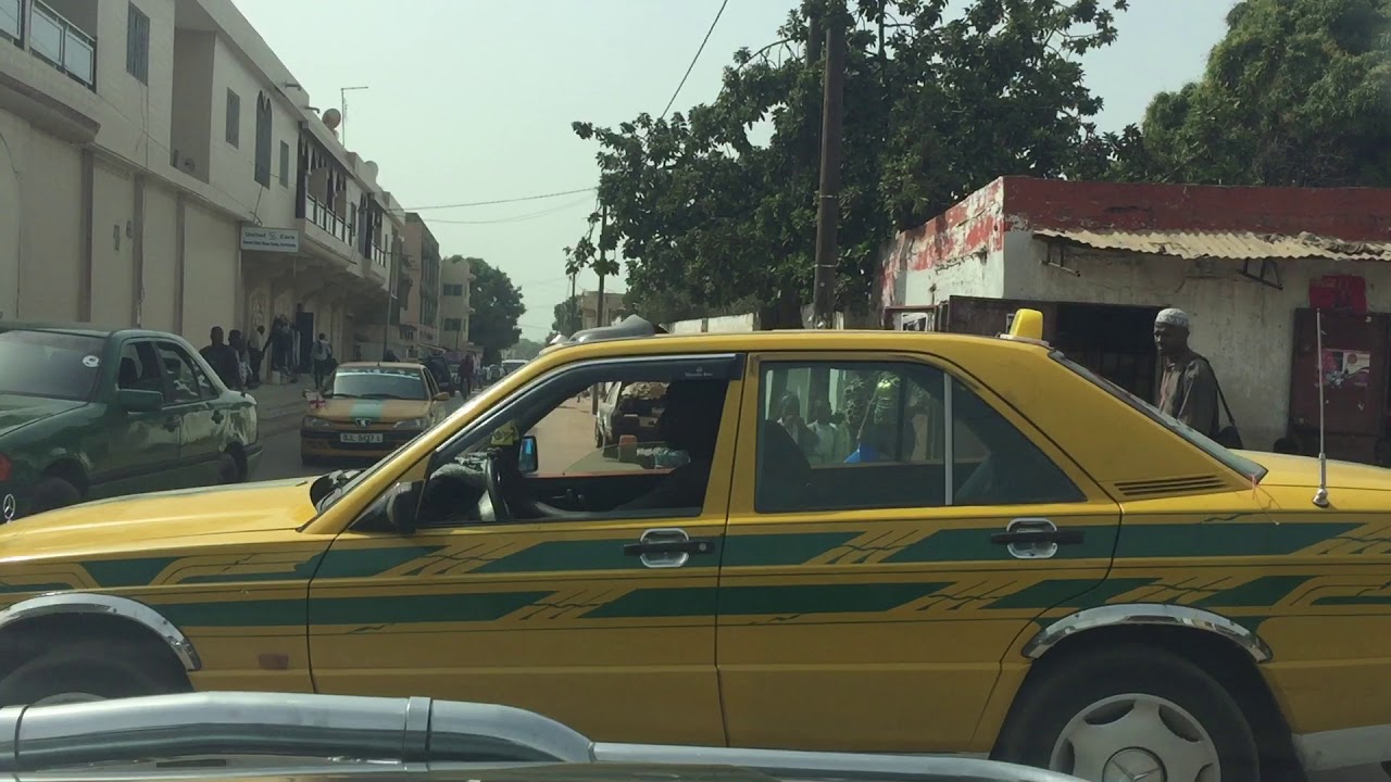 Driving around Serekunda Market, Gambia. 🚕