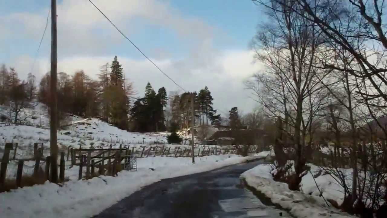 Winter Drive Down Mountain Road To Kinloch Rannoch Highland Perthshire Scotland