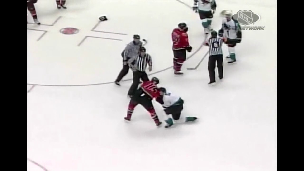 2004 Game 3 SJ/CGY - Flames mad about hotdog EN goal - Simon/Rathje Fight