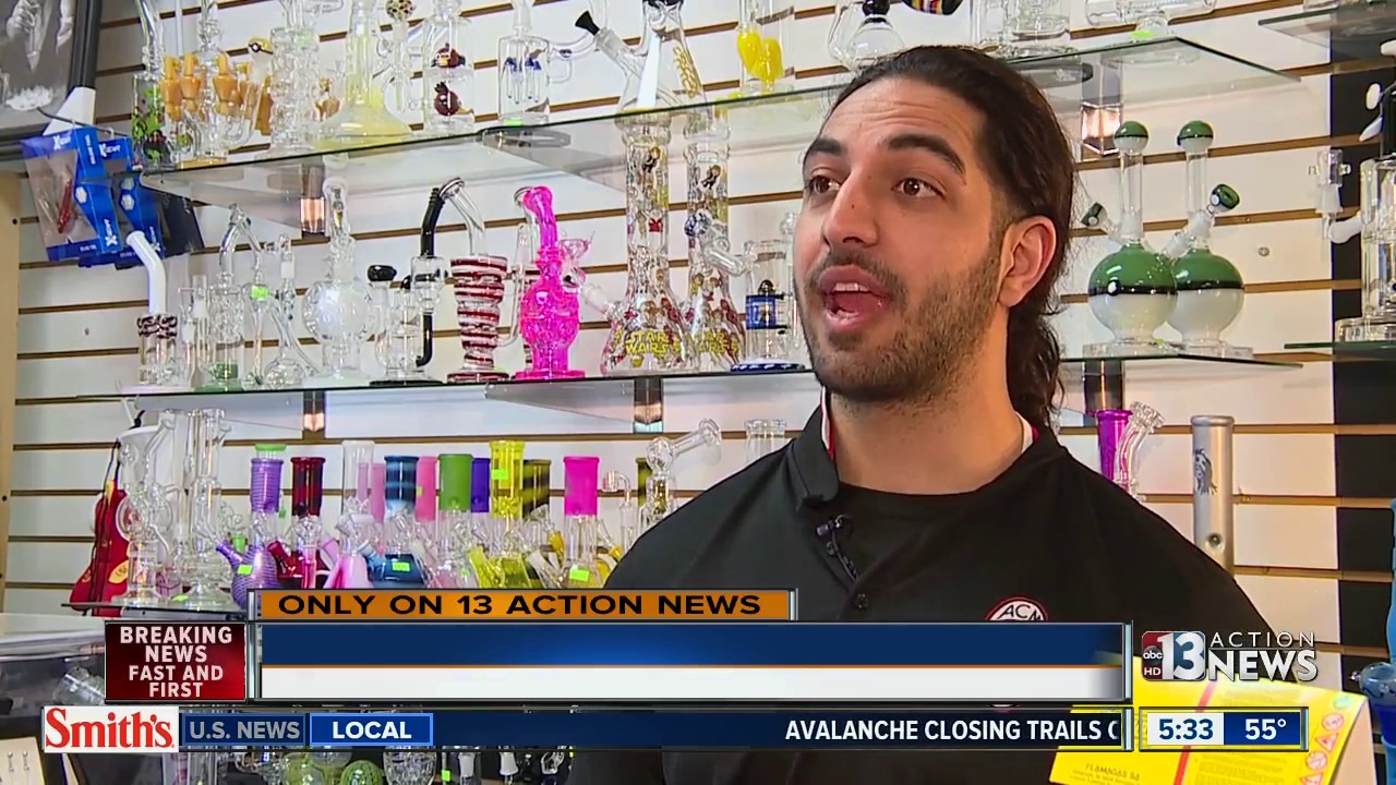 Smoke shop owner stands up to armed thief