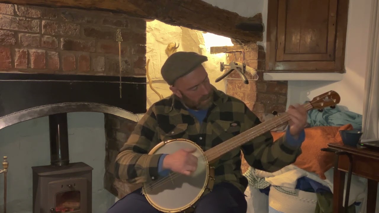 Lost John on a deep rim banjo with nylgut minstrels