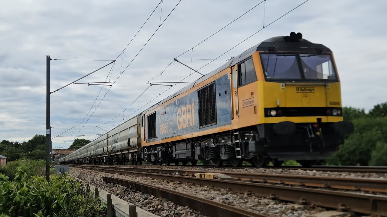 *Tones* Great British Railfreight 60056 & Northern 156423 passing a foot crossing near Fellgate