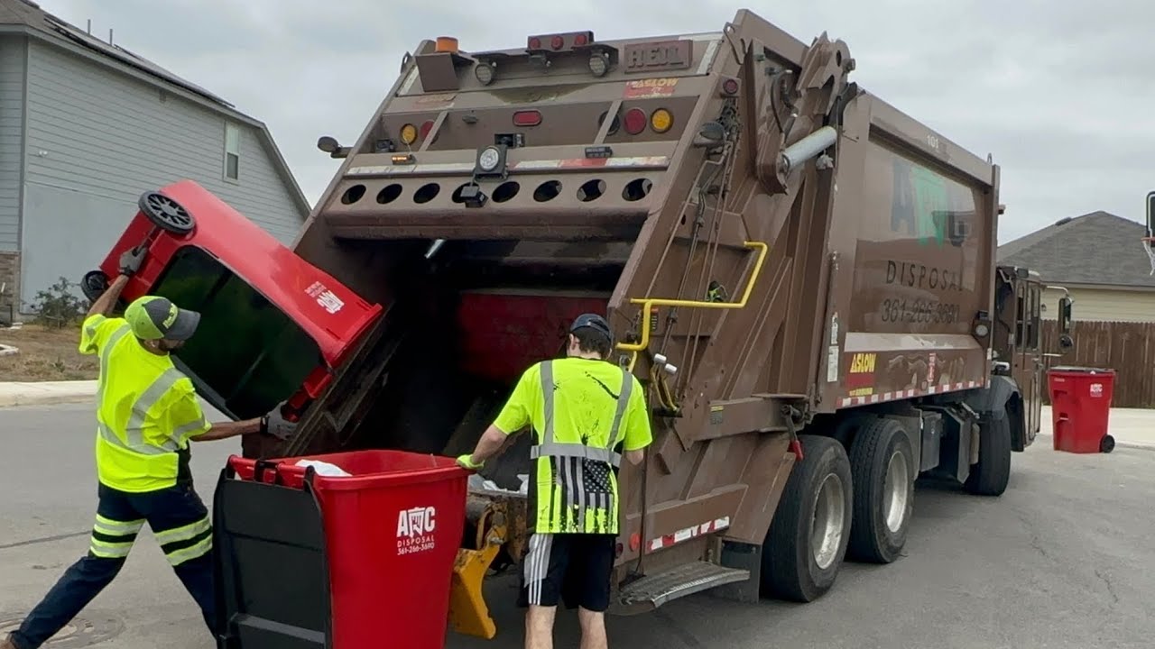 Very Special Crew on CCC Heil PowerTrak Rear Loader Garbage Truck Packing Heavy Trash from Red Carts