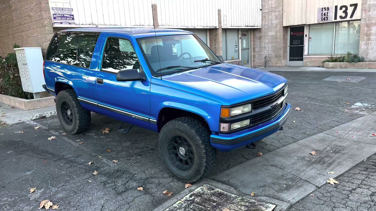 Obs 2 door Chevrolet Tahoe and a Dripped out Custom F-body Camaro SS
