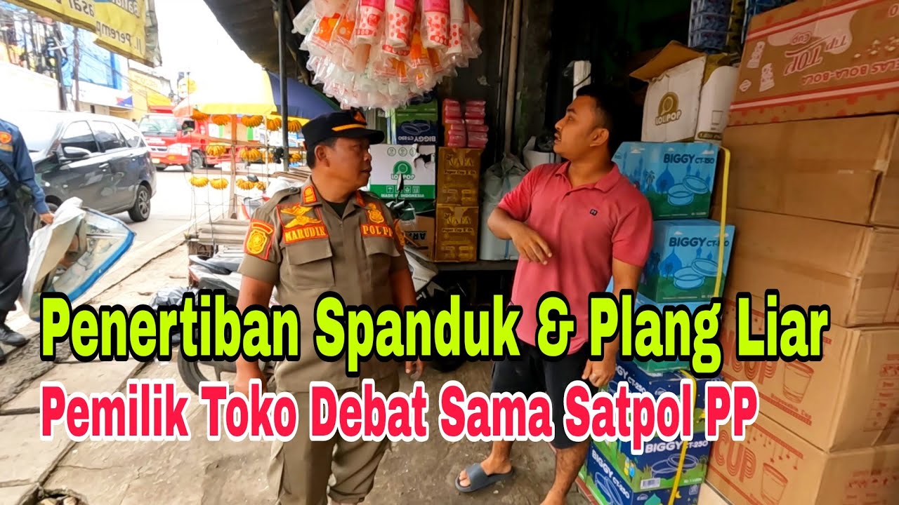 penertiban spanduk & plang liar, pemilik toko tidak terima spanduknya di copot & akhirnya debat