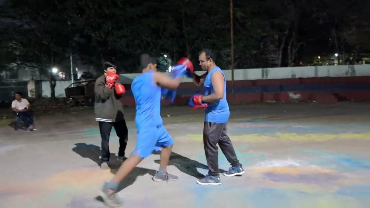Farhath and yerni Kumar padding with coach anil boxer training DMBC call9989791988 boxing club Indr