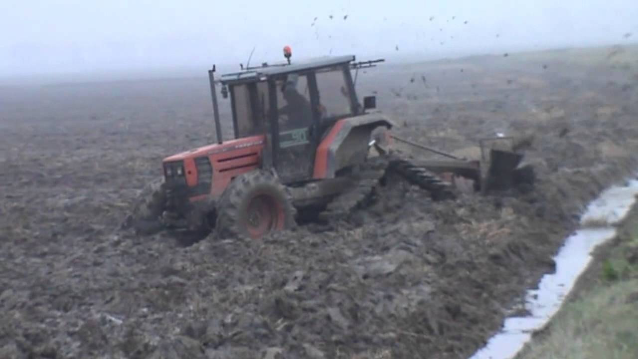 MUST SEE! Tractor (ARMED) vs Mud