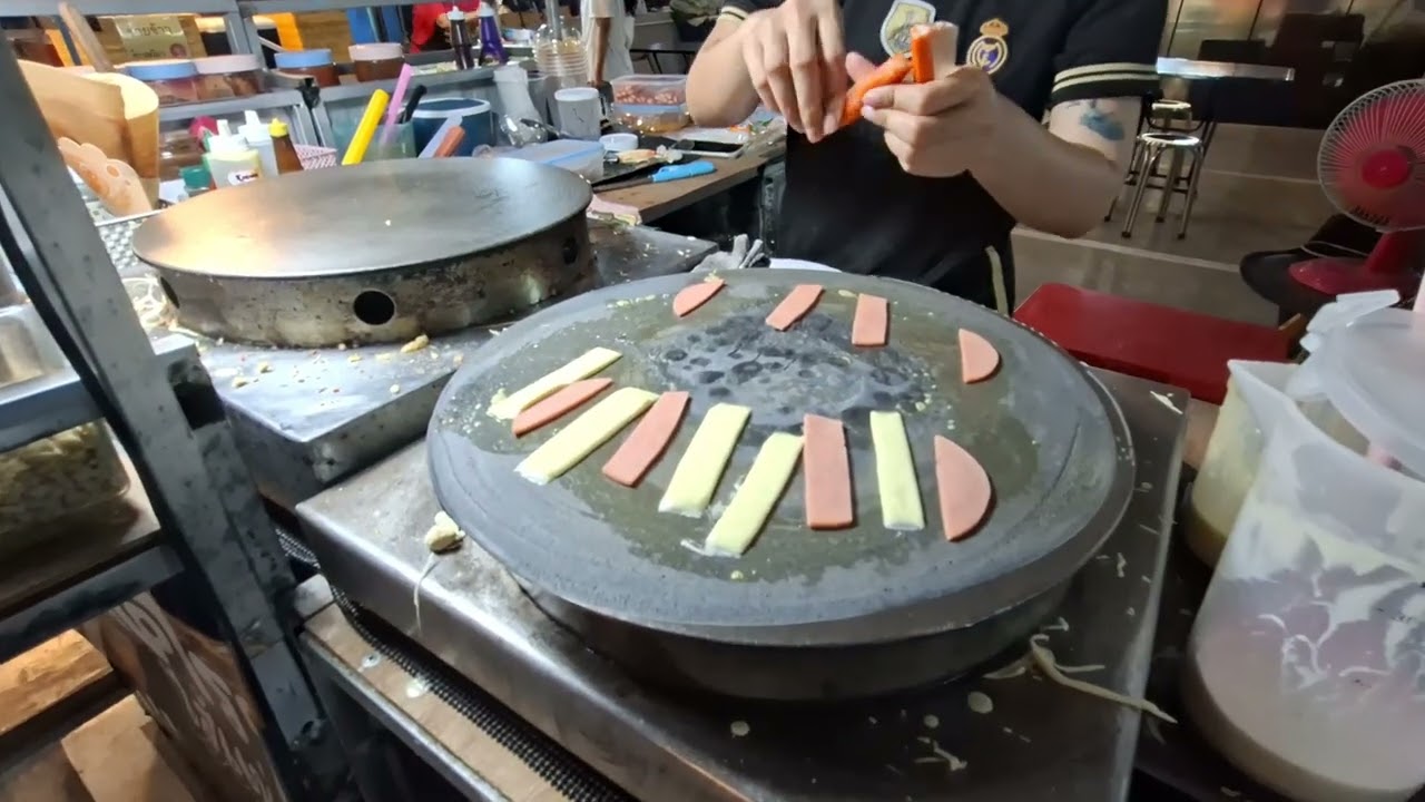 หาซื้อของกินเล่นที่ตลาดสิงหสุตกัน