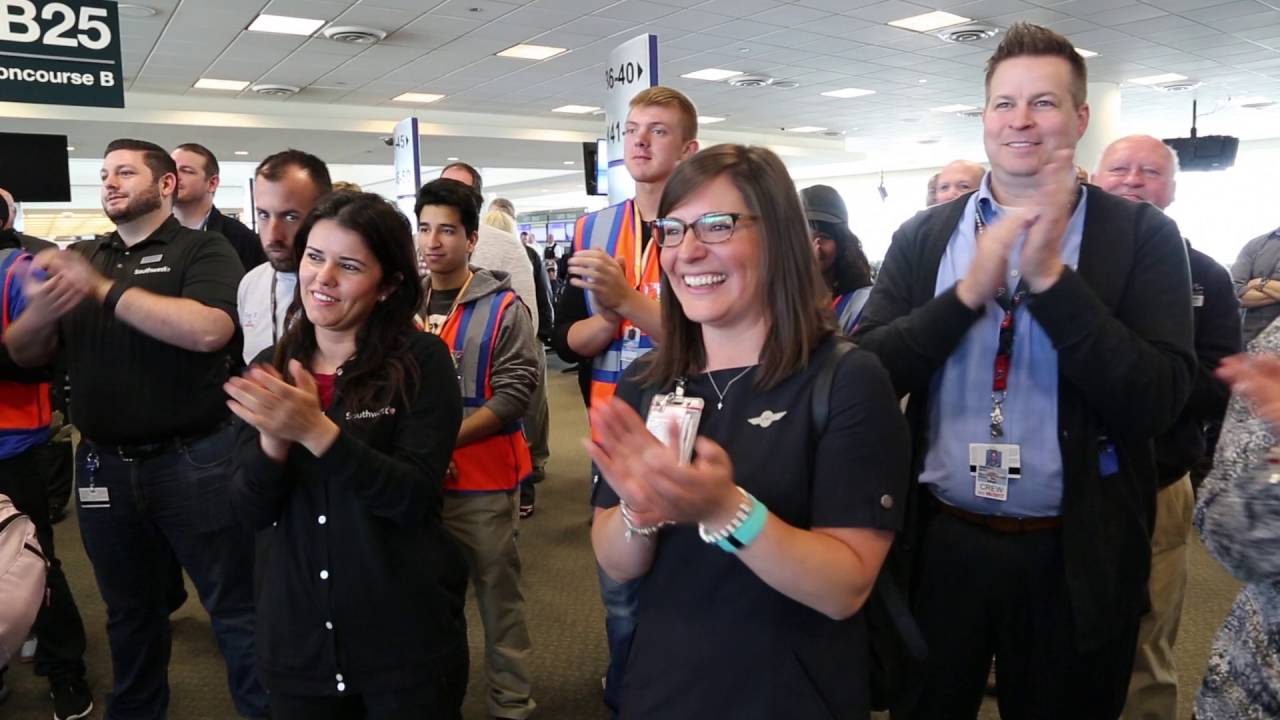 A Southwest Airlines Flight Attendant is Surprised with $5,000 prize!