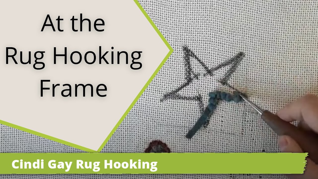 At the rug hooking frame....
