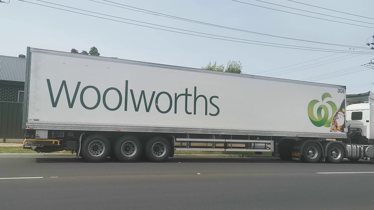 Woolworths truck stopped at the bus stop
