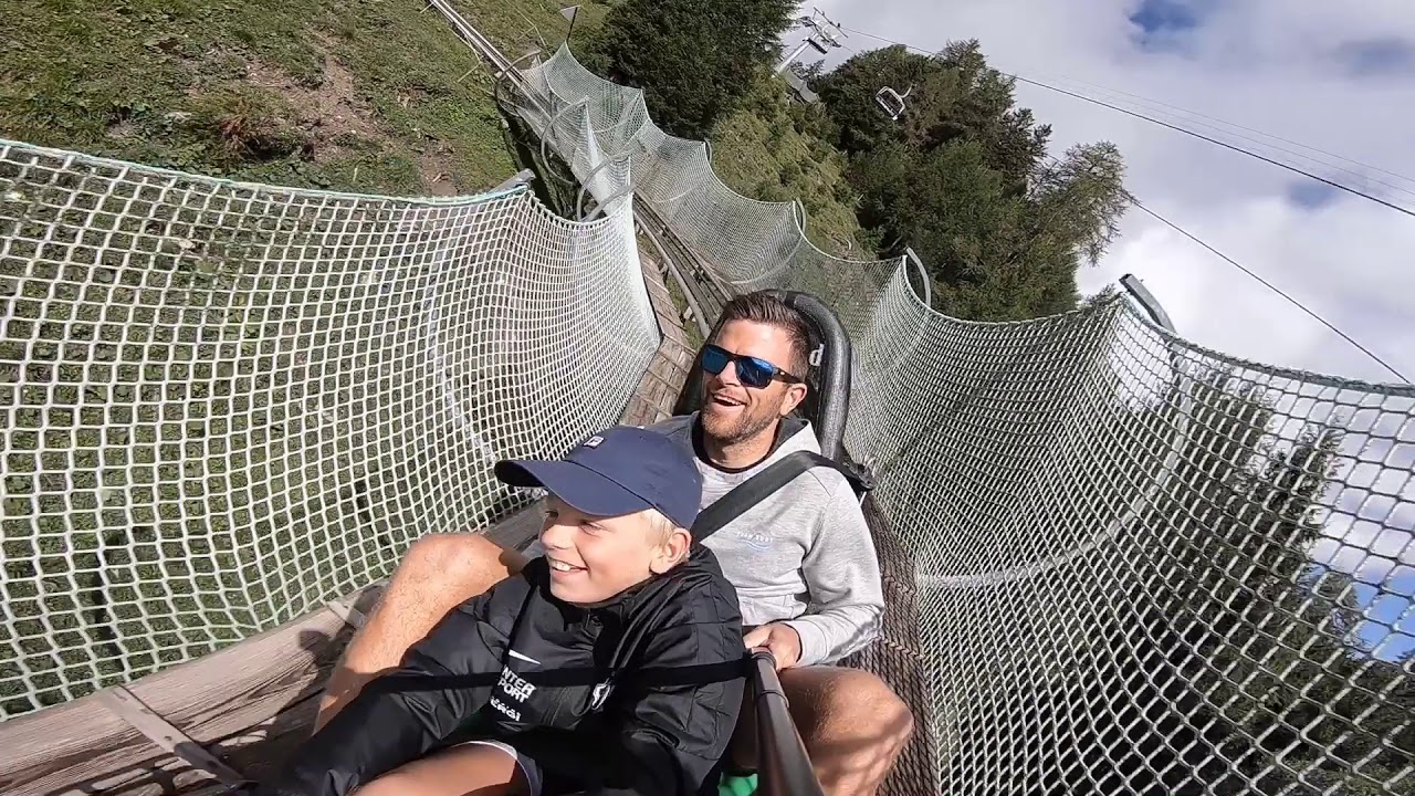 Toboggan run fun in Arosa, Switzerland (Rodelbahn)