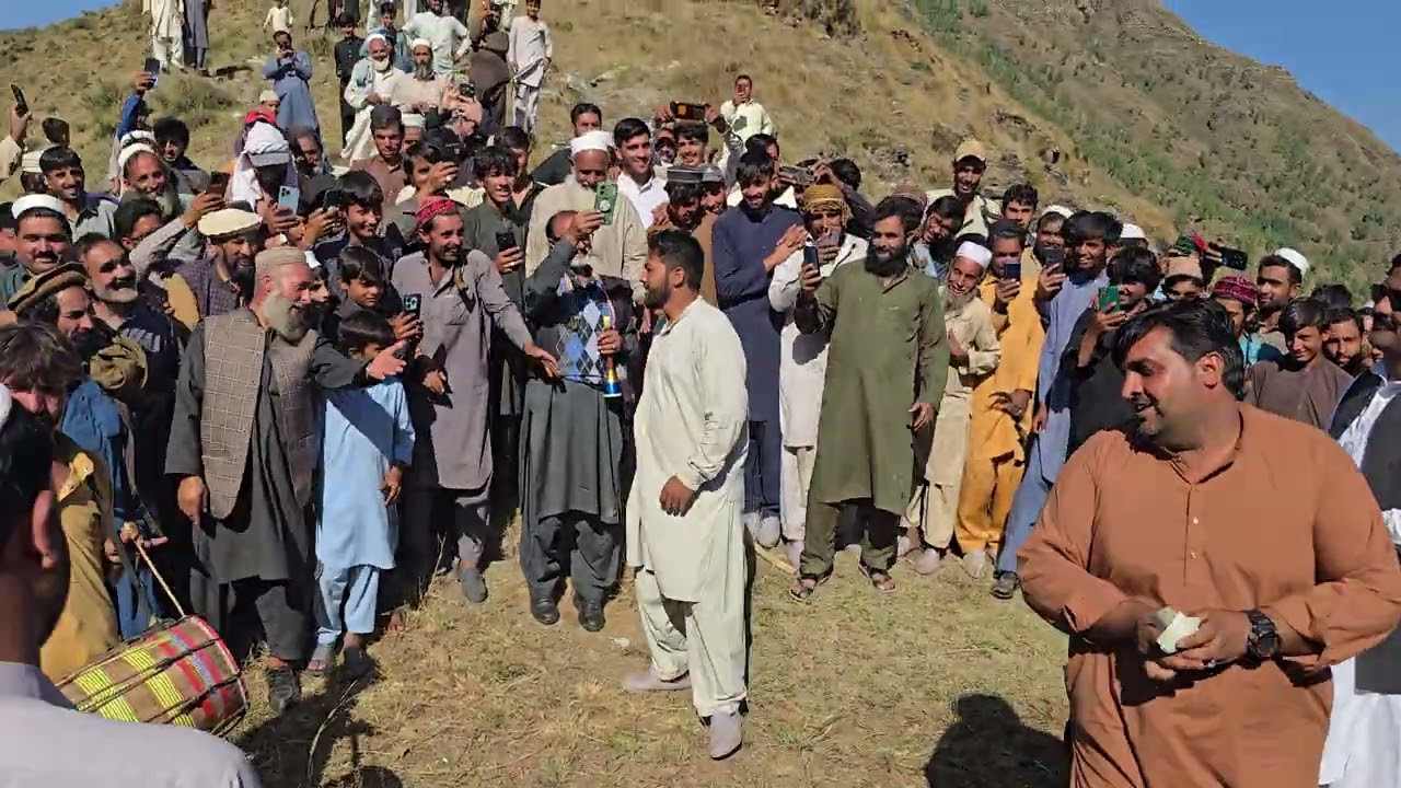 Local dance and music during grass cutting in Swat 