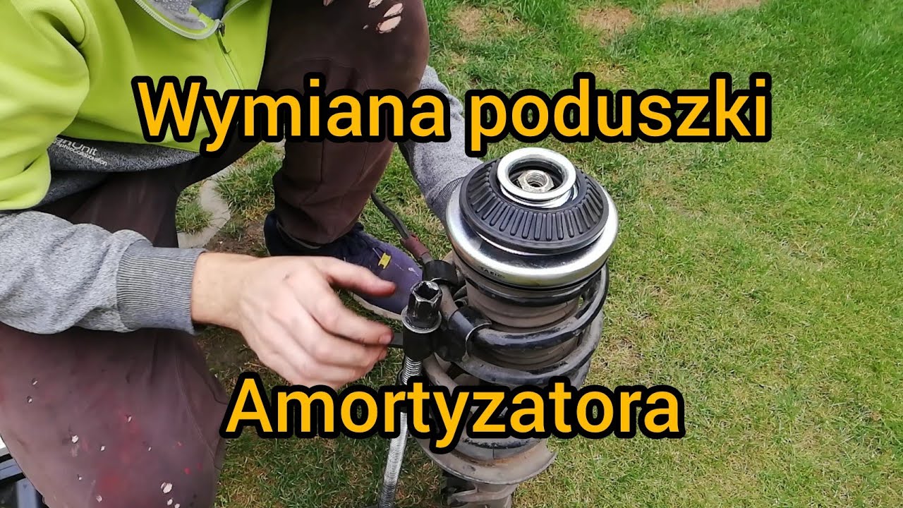 Wymiana poduszki amortyzatora i łożyska mcpersona Opel astra H Zafira B.