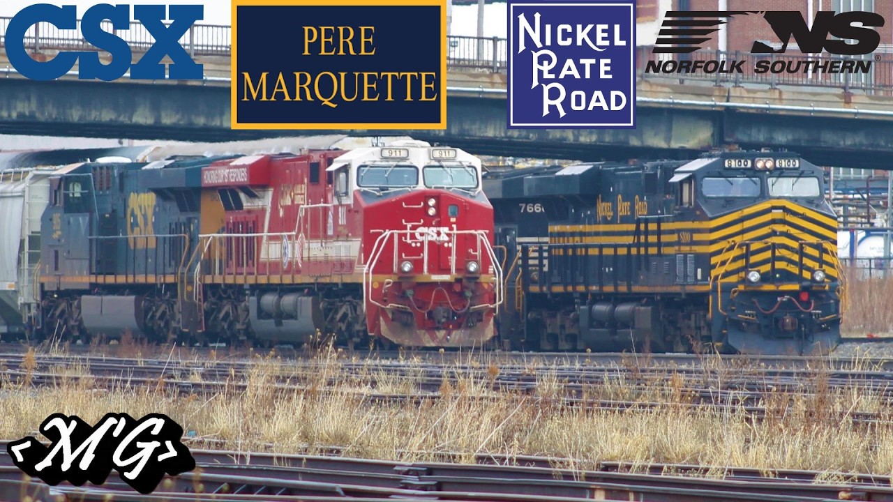 CSX 911 Meets NKP Heritage Unit Near Abandoned Yard