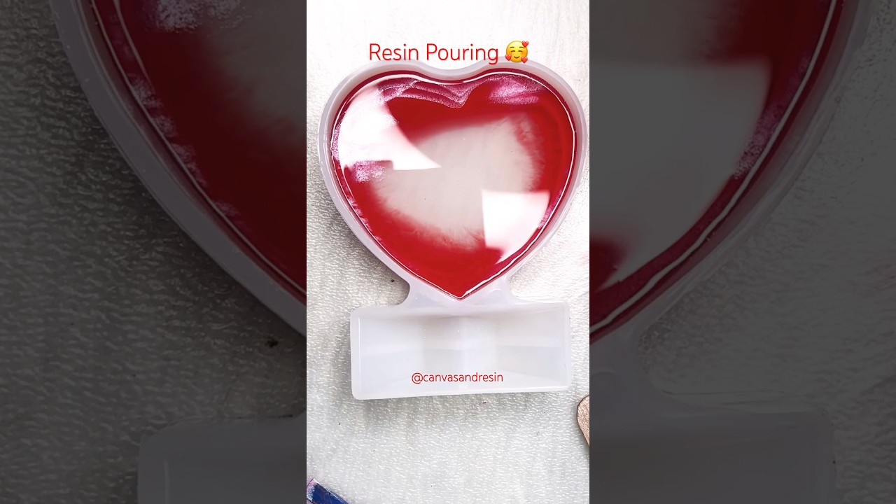 Pouring Resin Into A Heart Shaped Mold 