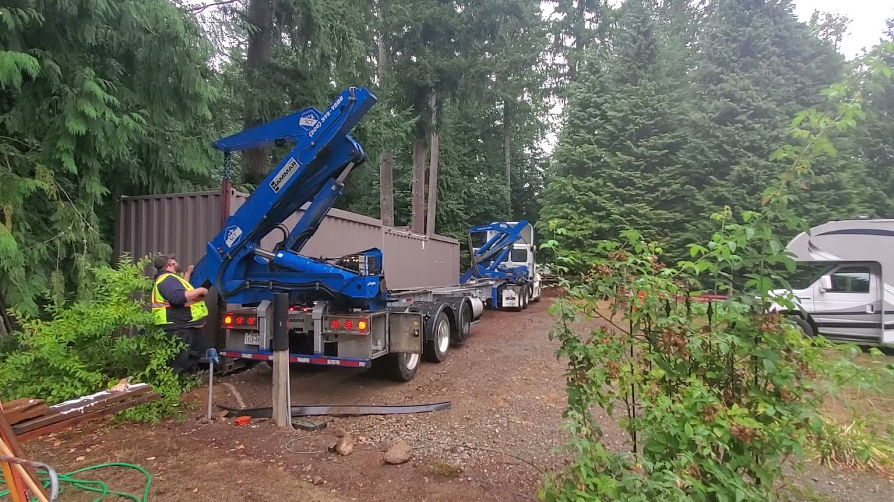 45 Container cabin load. Side-loading Hammar trailer.