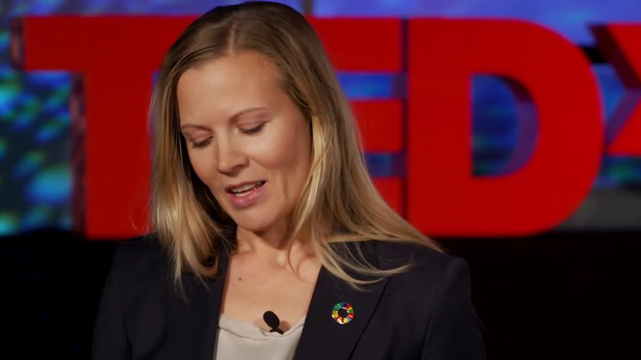 Investing in renewable energy in developing countries | Heidi Finskas | TEDxSkift