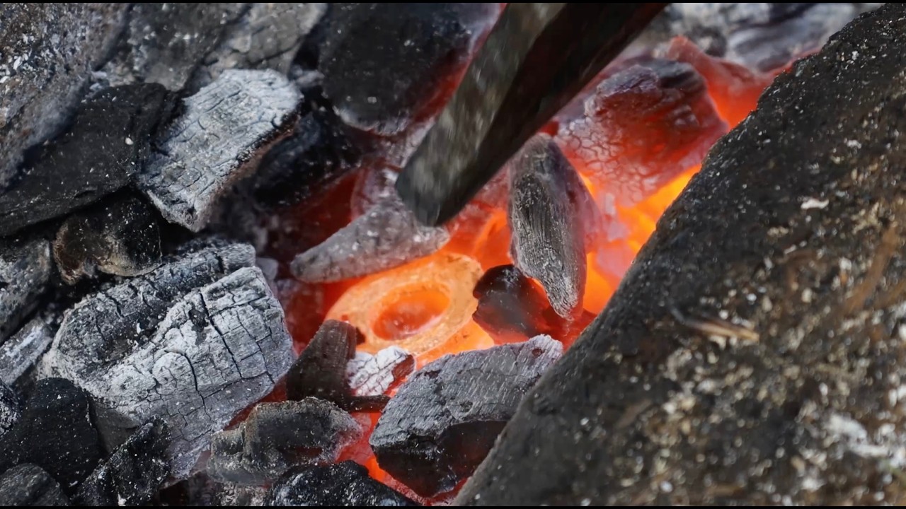 Hand Forging Solid Gold Wedding Rings in a Medieval Forge
