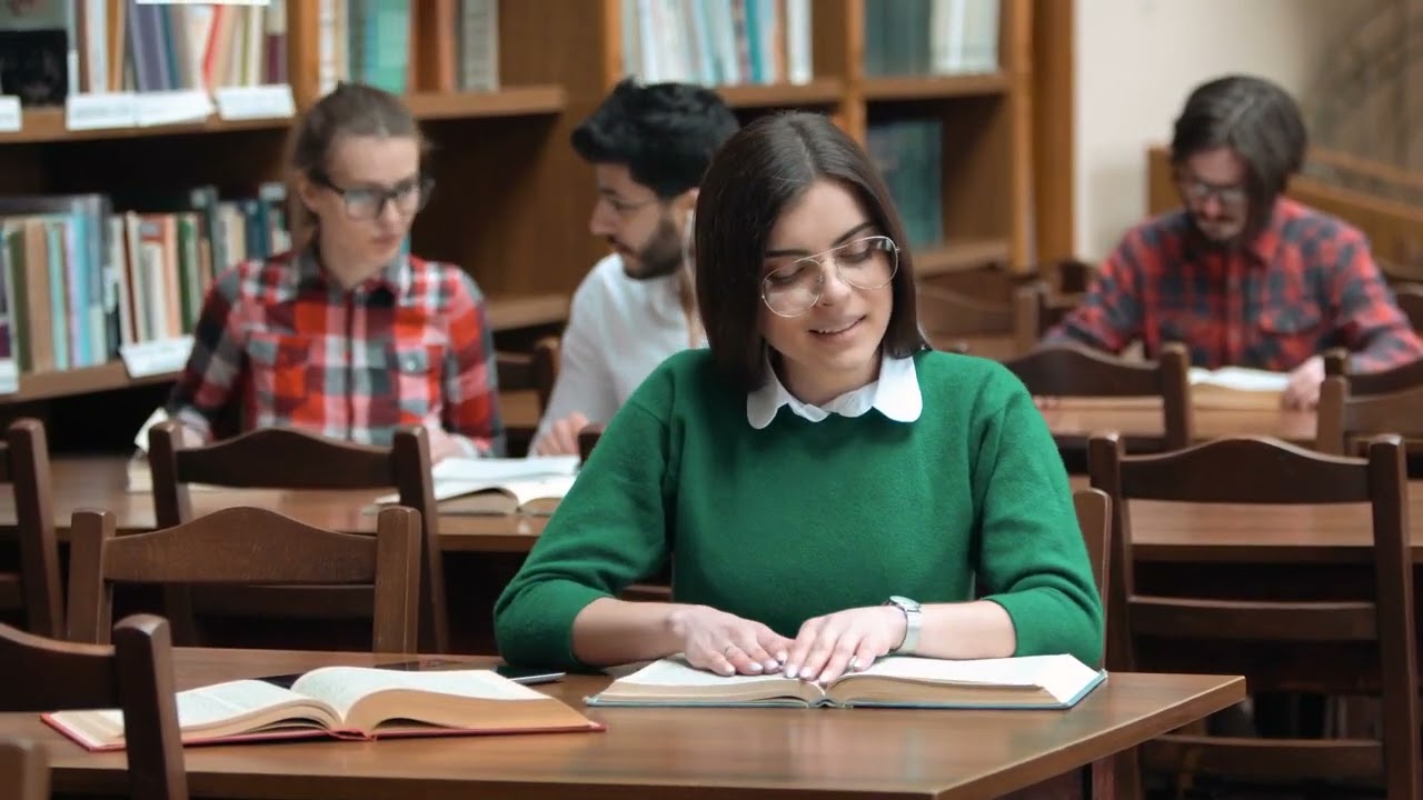 mixkit students do academic research in college library 8882 medium
