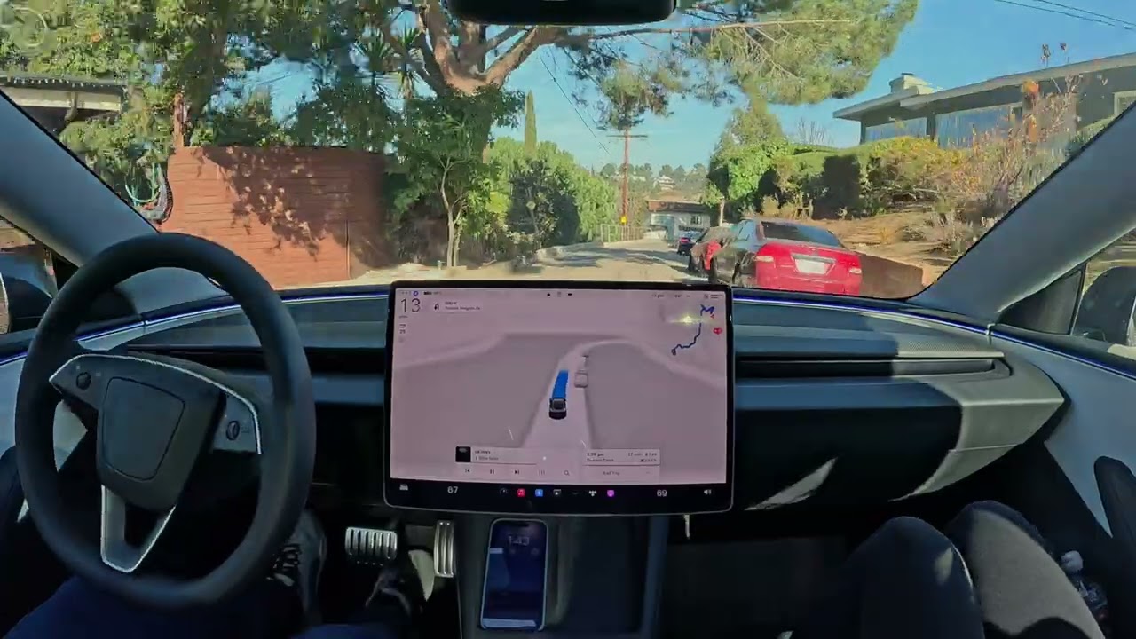 Tesla FSD 13.2.2 Performs a U-turn on a Narrow Street