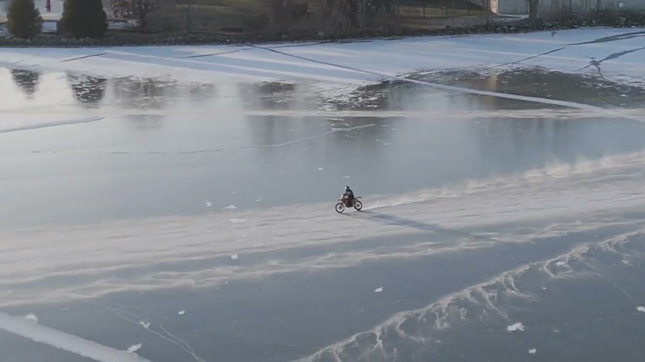 An artistic ice design was done by this guy on his bike on the ice of Lake Winnebago, WI, w/ MUSIC.