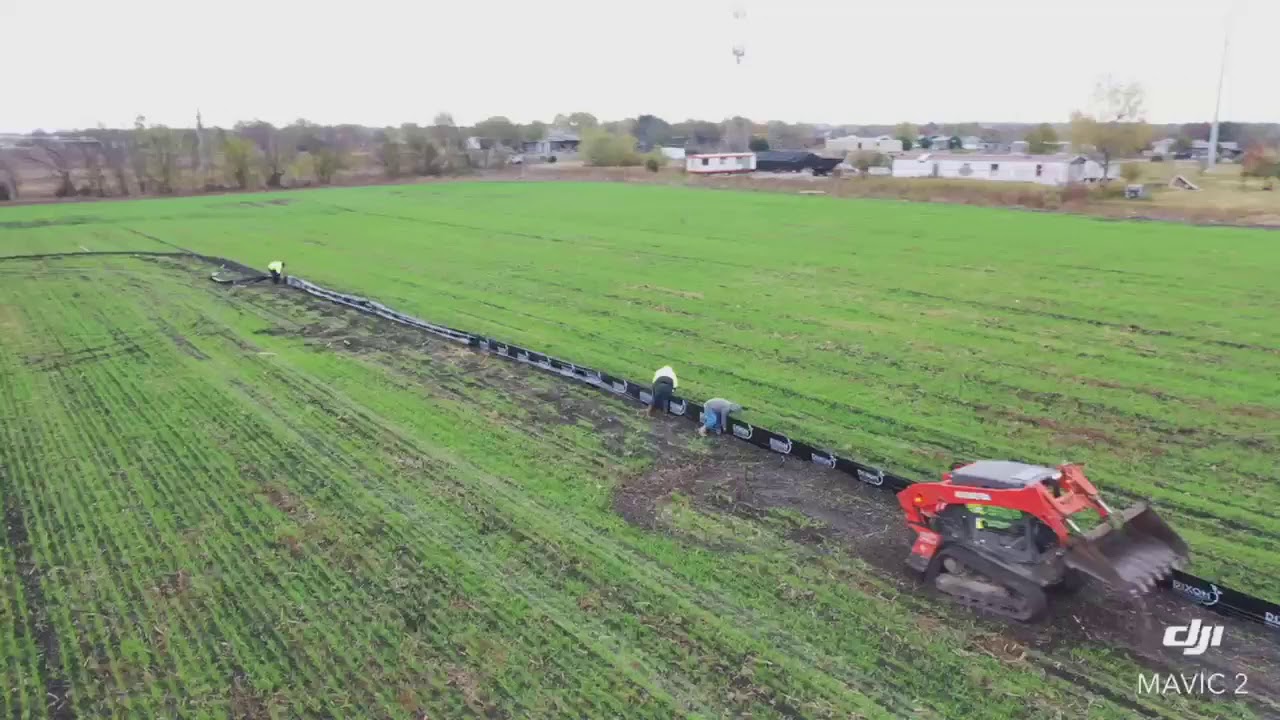 Dixon Erosion Control Team installing silt fence.