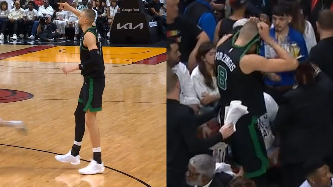 Kristaps Porzingis puts jersey over his head after scary non contact leg injury vs Heat 😬