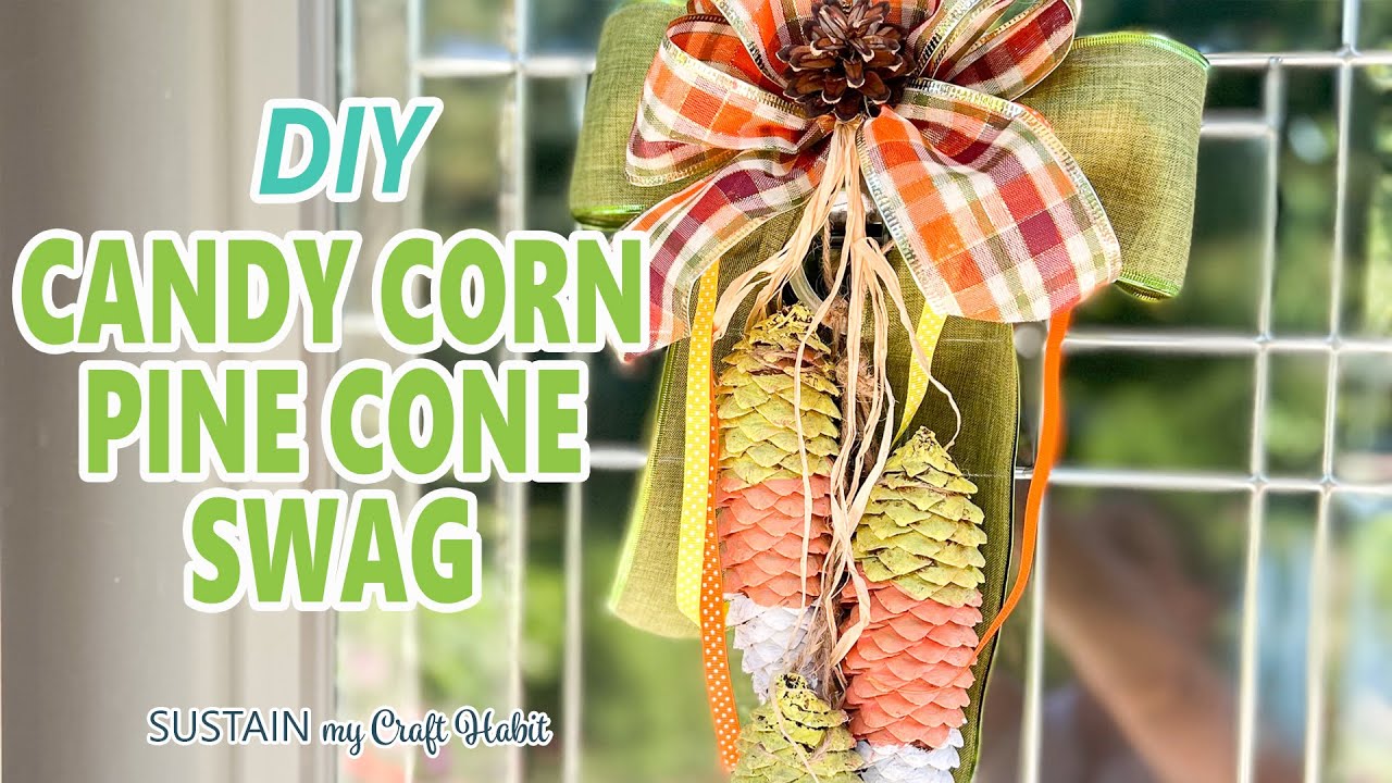 Make this DIY Candy Corn Pine Cone Swag for your Front Door! 🍂