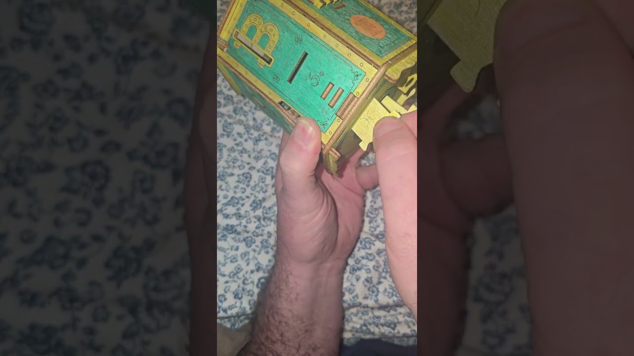 Colorized Fort Knox box puzzle by ESC WELT. 