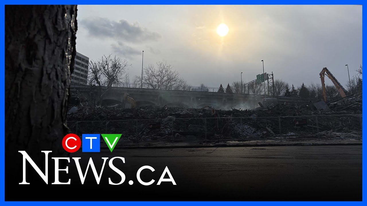 Firefighters continue to deal with hot spots in major fire in historic Montreal building