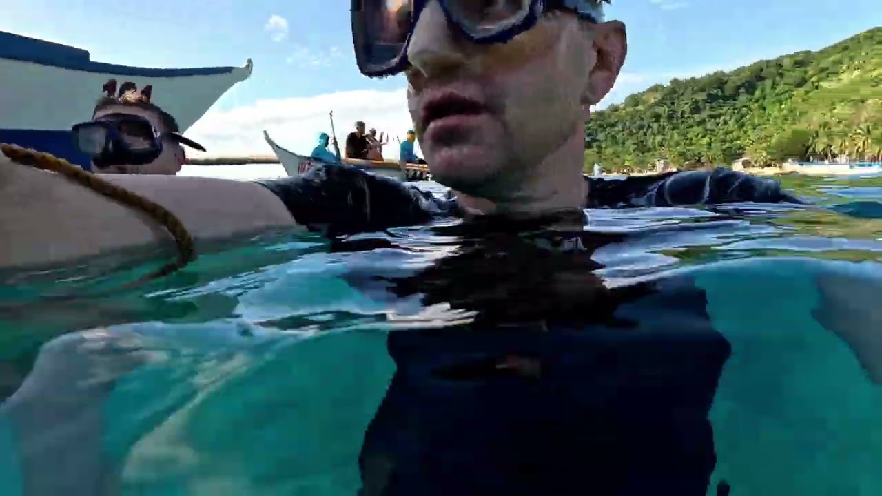  Ep 36.Men in wheelchairs are swimming with sharks. Very dangerous.Philippines on Cebu Island